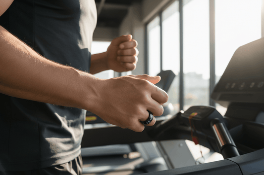 Person wearing Colmi R12 Smart Ring while jogging on a treadmill, showcasing health monitoring features.
