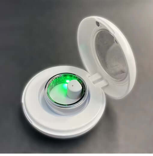 Dixsg Universal Charger for Smart Rings, white design with green light, open lid for easy access.