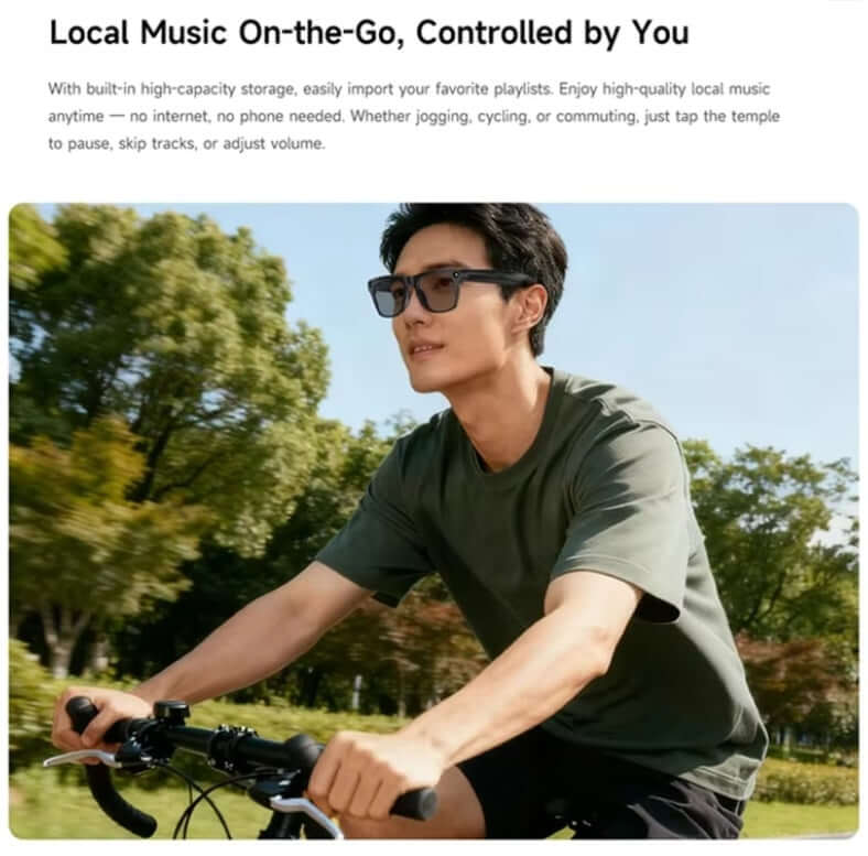 A person wearing glasses riding a bicycle, enjoying local music while exercising outdoors.