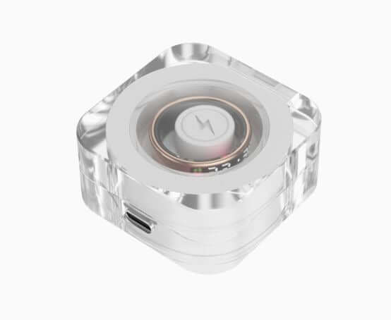 Luxuglow Universal Charger for Smart Rings - Transparent, compact design with LED indicator and USB port.